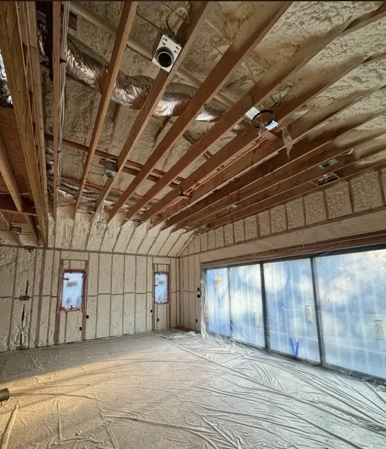 Interior walls and ceiling insulated with spray foam during new construction in Junction City